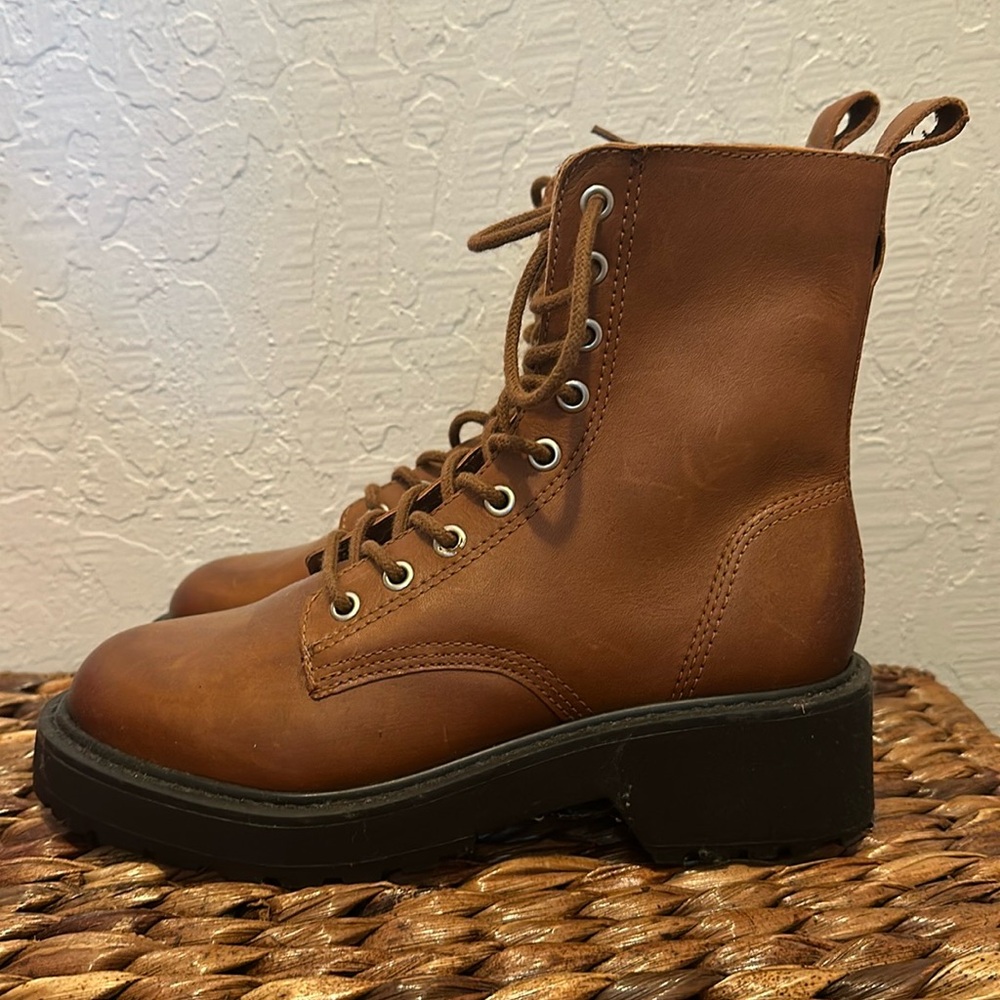 NWT. Steve Madden boot. Cognac color. Never worn. Perfect for fall/winter.